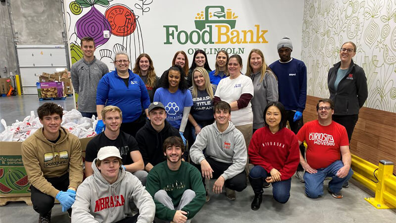 Student gathered for a group photo at the Food Bank of Lincoln.