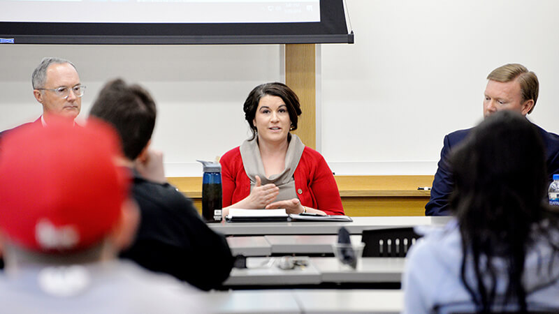 Classroom discussion with faculty and students