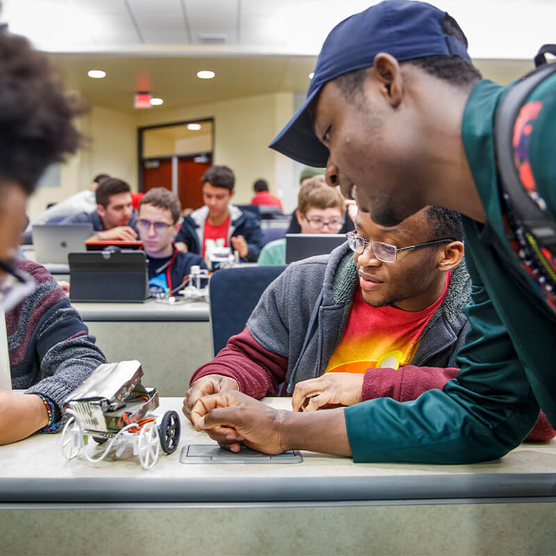 Engineering students work on ground drone project