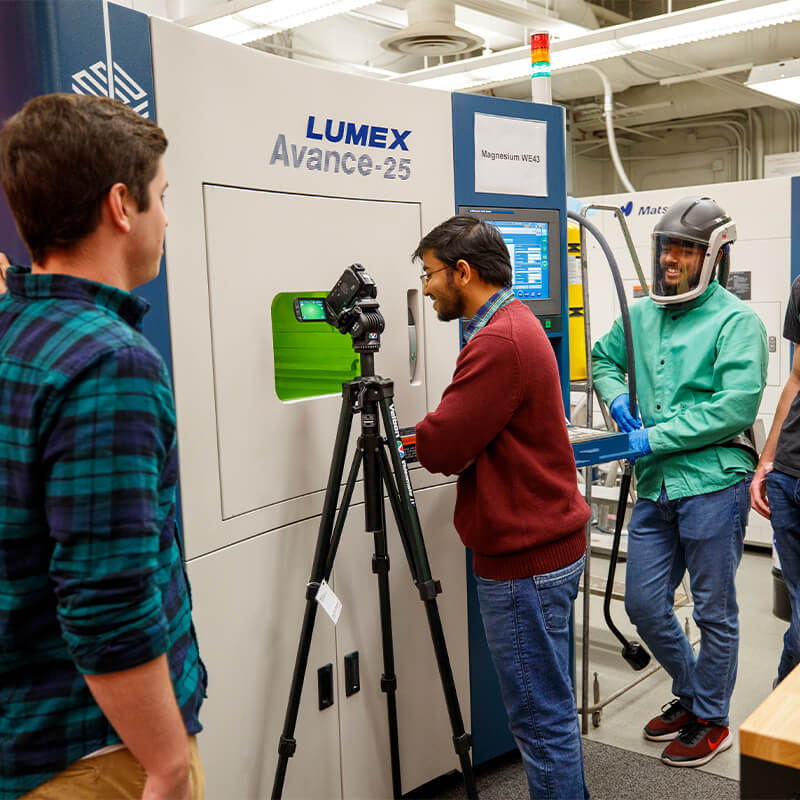 Students use video camera in lab