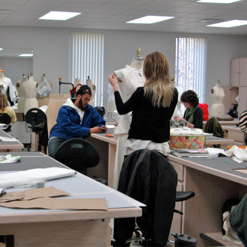 Students work in textile lab.