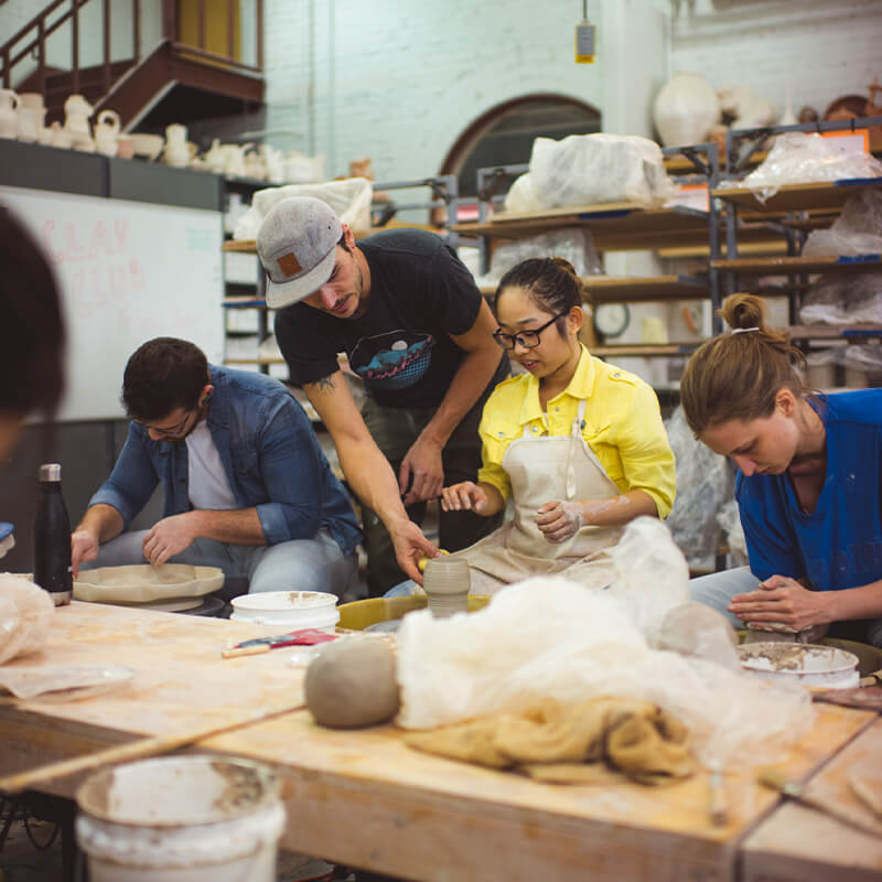 Students working on ceramics project