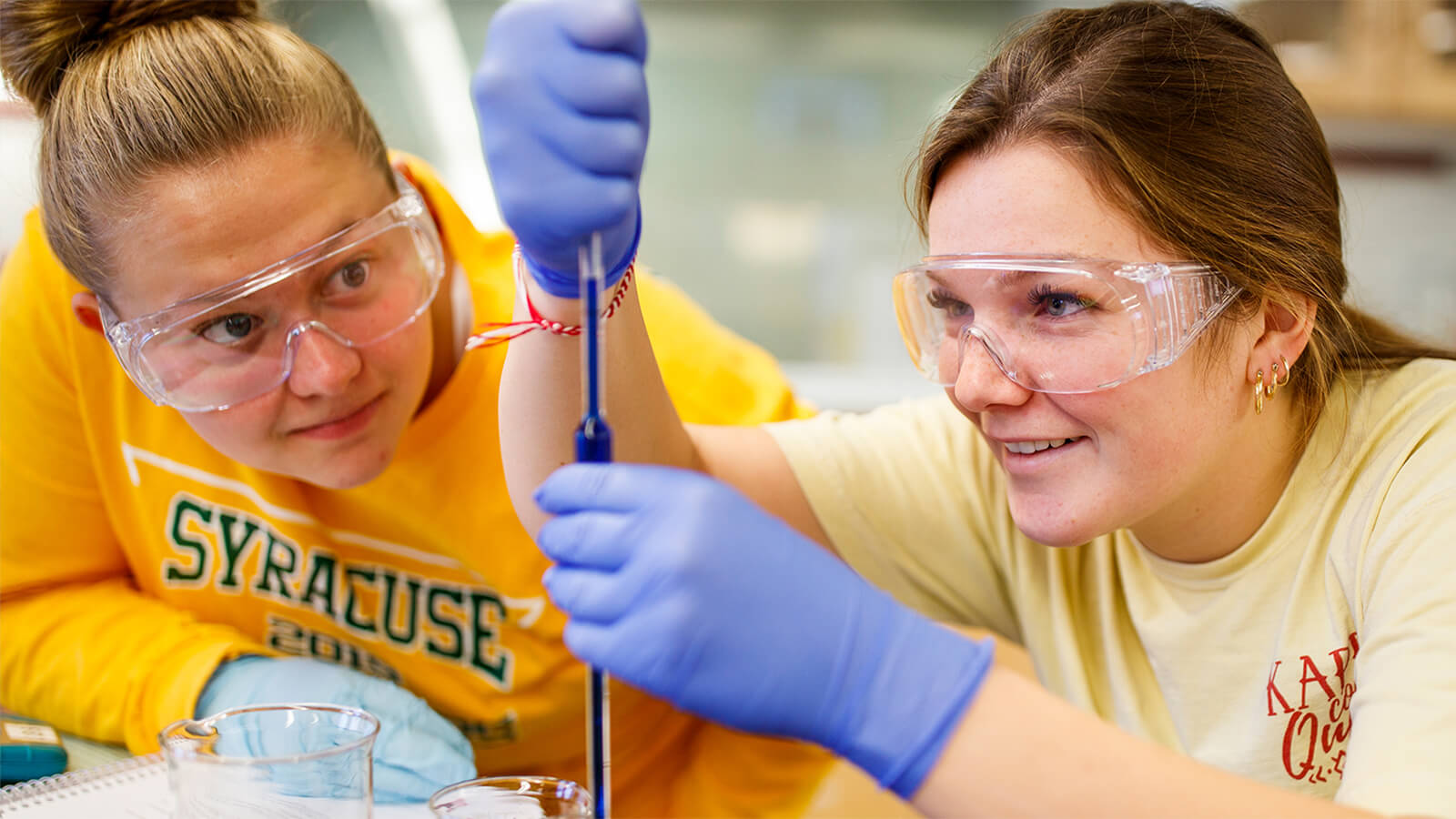 Two students working on a lab project