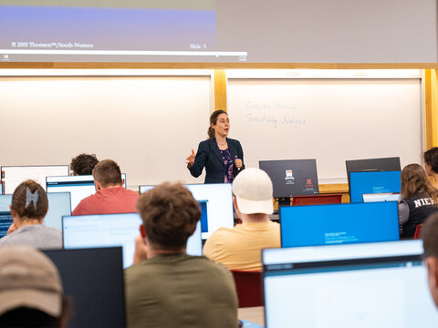 Students in a classroom listening to a lecture.
